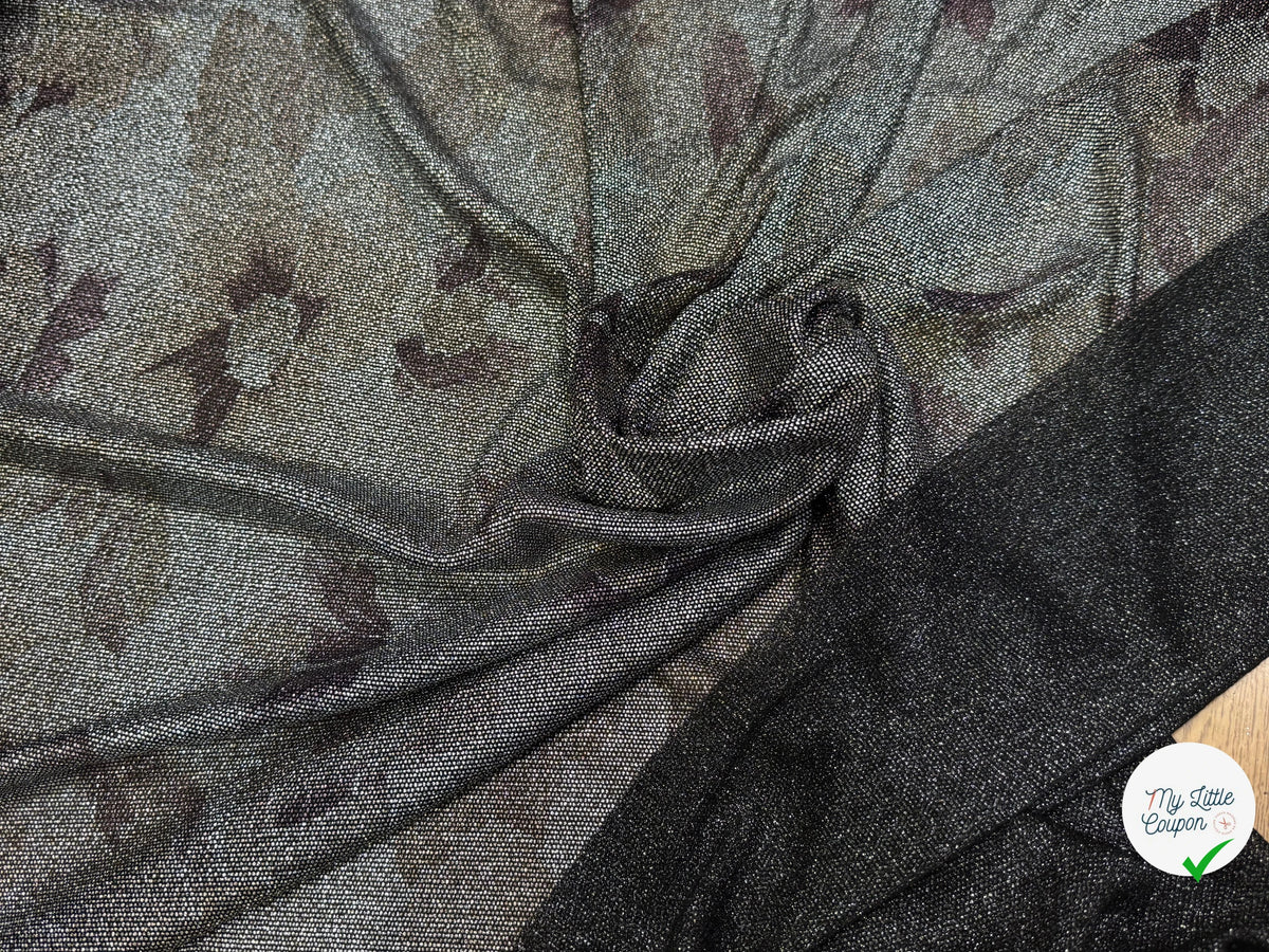 Tissu maille de fête argentée florale noir - texture en gros plan