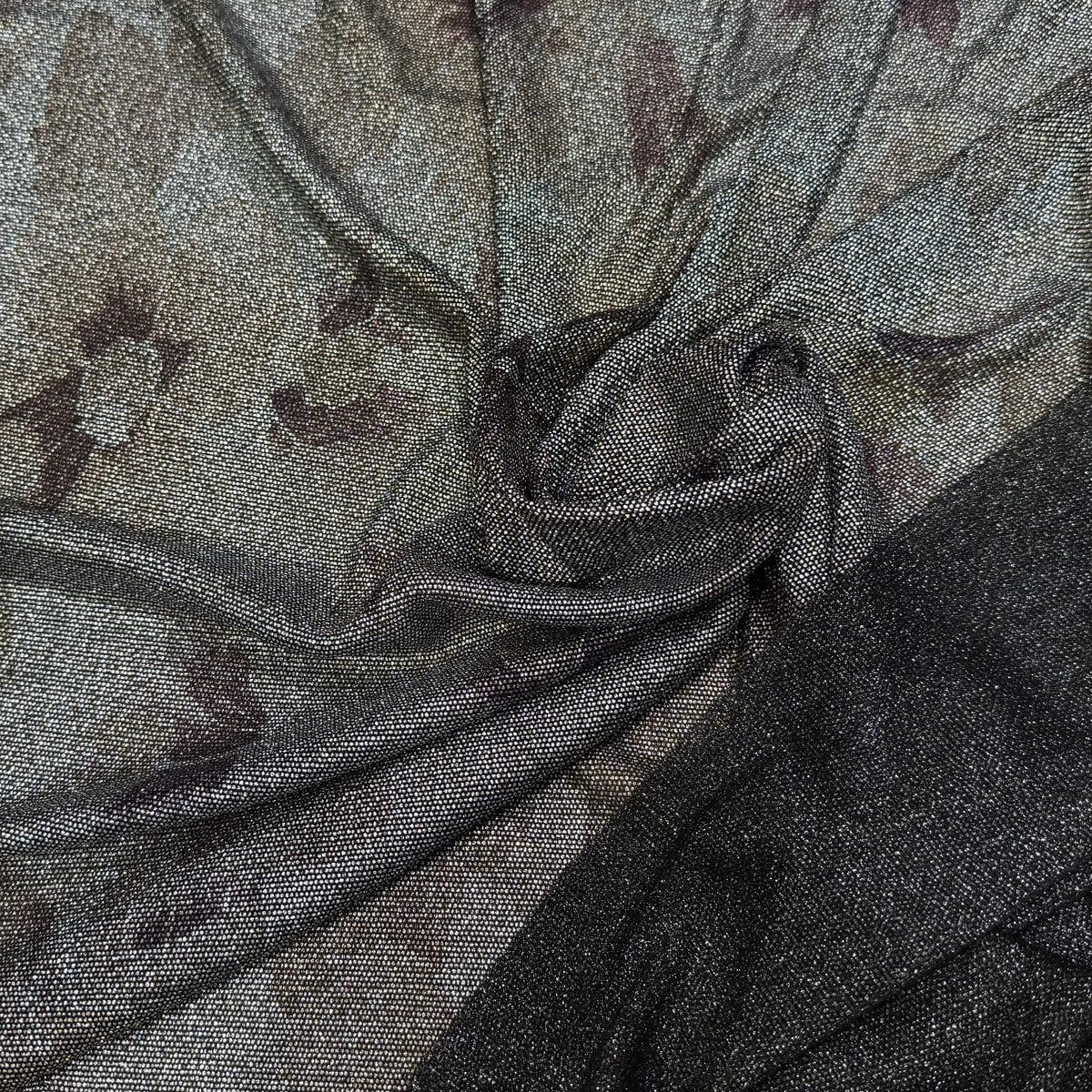 Tissu maille de fête argentée florale noir - texture en gros plan