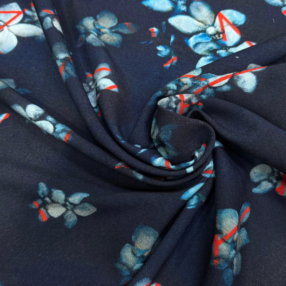 MAILLE VISCOSE STRETCH IMPRIMÉ GRANDES FLEURS BLEU CIEL FOND MARINE - My Little Coupon