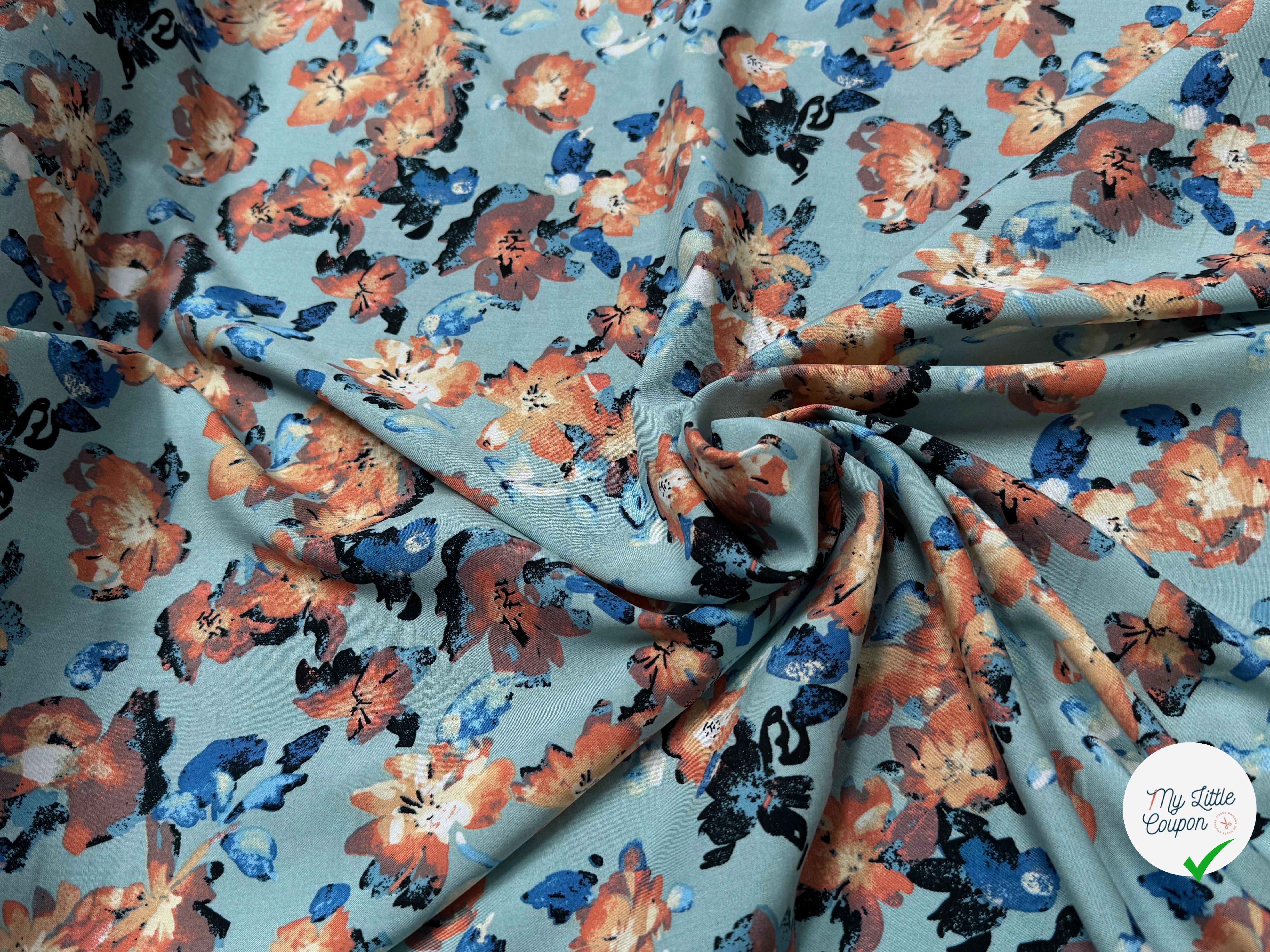 TISSU 100% VISCOSE IMPRIMÉ GROSSES BASES DE FLEURS FOND VERT D'EAU - My Little Coupon