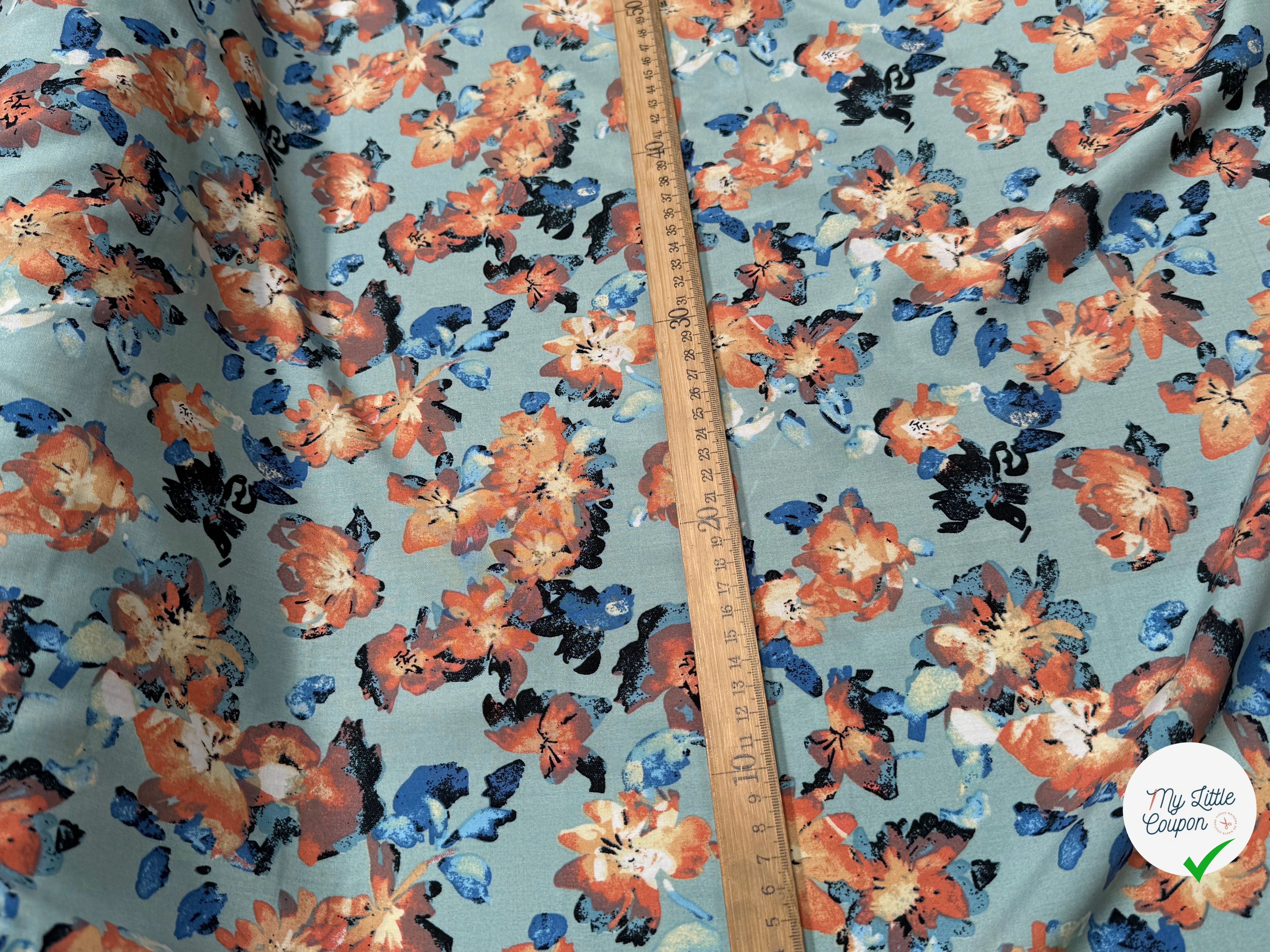 TISSU 100% VISCOSE IMPRIMÉ GROSSES BASES DE FLEURS FOND VERT D'EAU - My Little Coupon