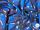 Tissu coton imprimé à motif graphique bleu