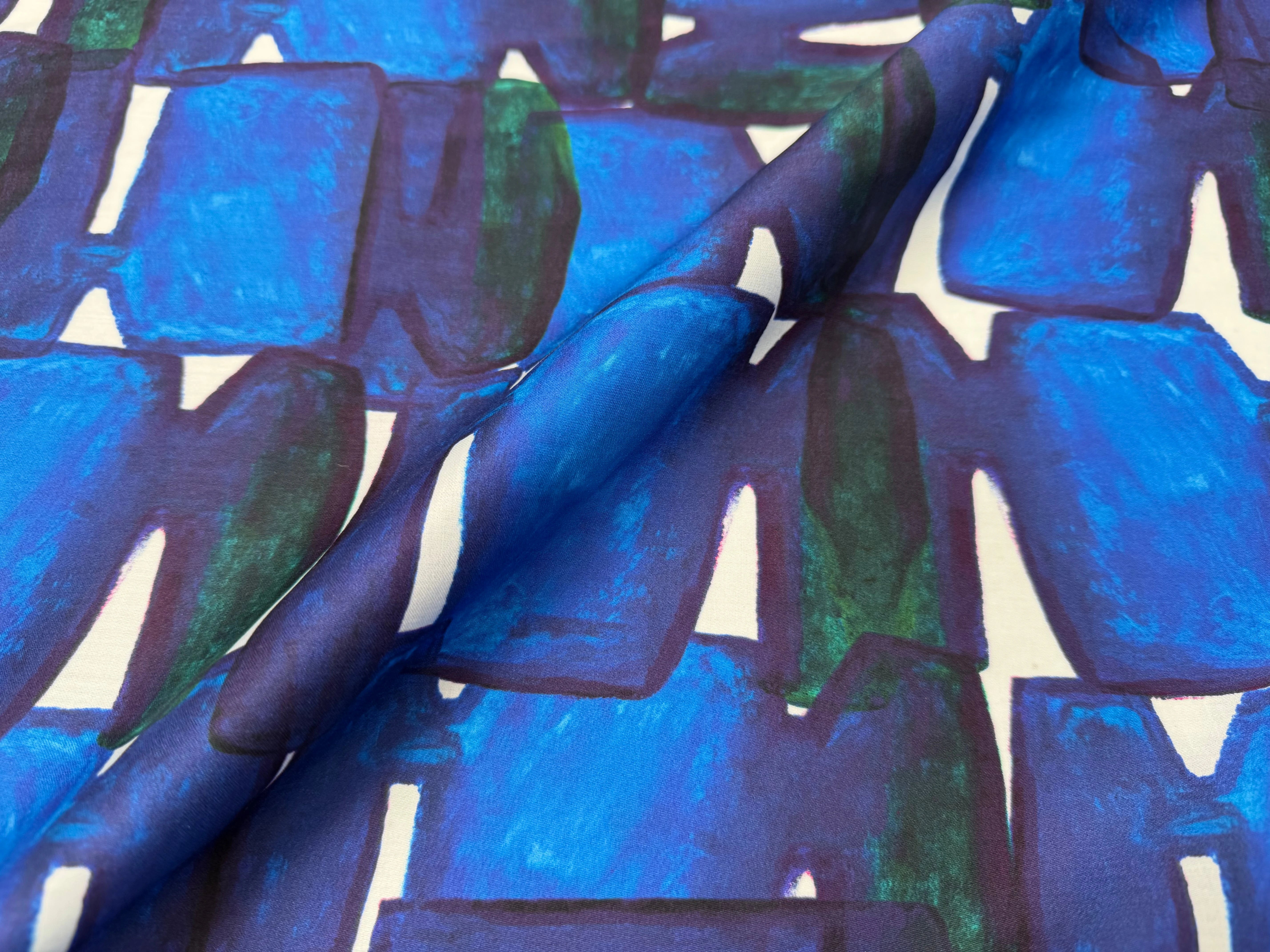 Coton imprimé graphique bleu pour la couture