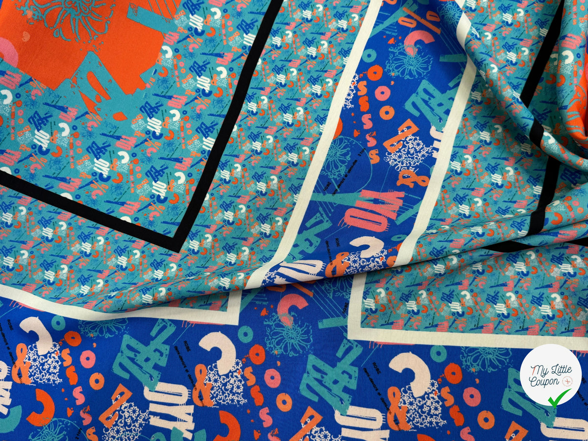 CRÊPE DE VISCOSE FLUIDE IMPRIMÉ TYPOGRAPHIQUE BLEU ET ORANGE FANTASY TYPO ORANGE - My Little Coupon