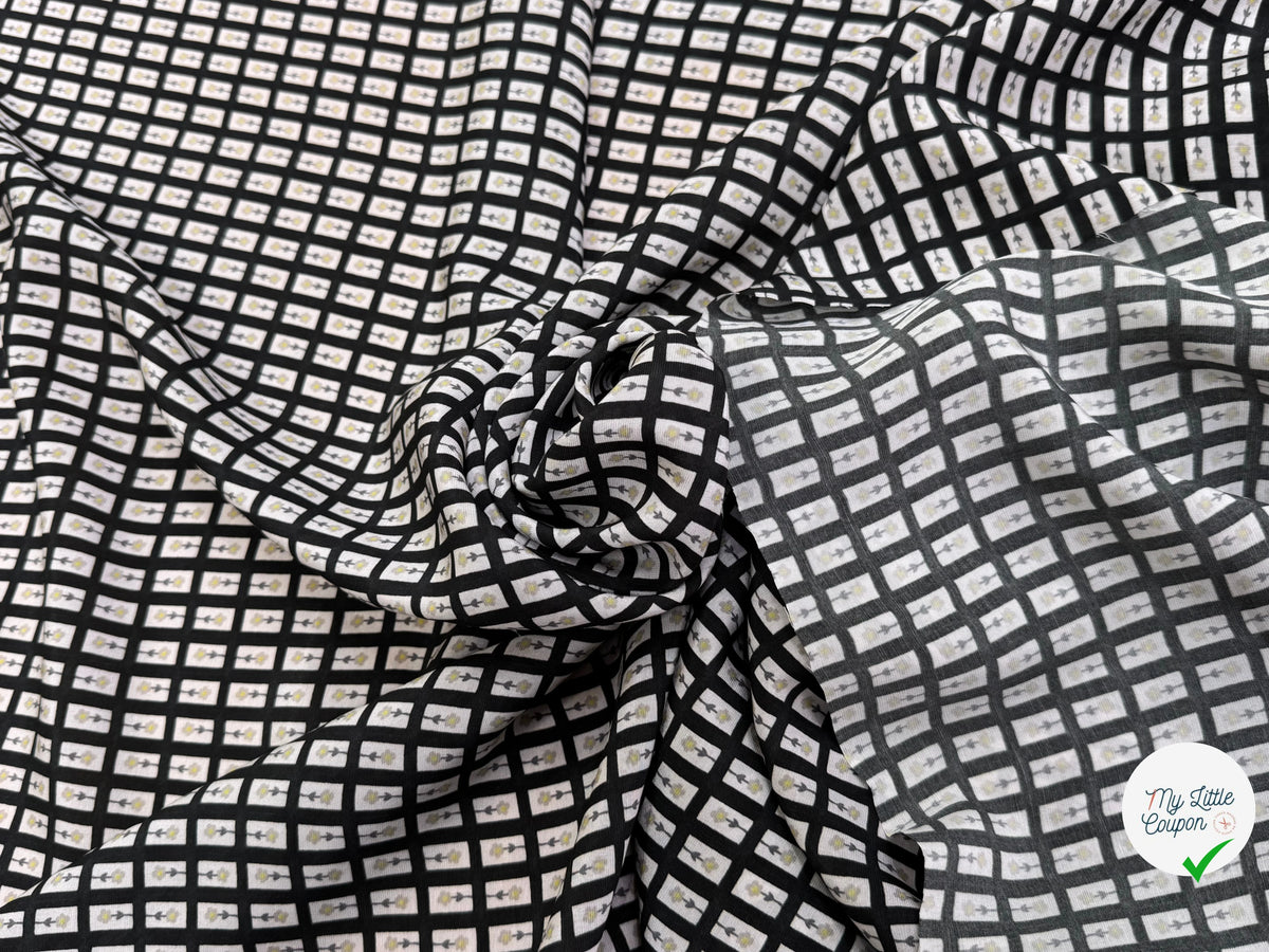 CRÊPE DE VISCOSE IMPRIMÉ SEMIS DE FLEURS FOND NOIR - My Little Coupon
