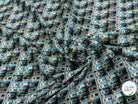 CREPE DE VISCOSE STRETCH IMPRIMÉ GRAPHIQUE BULDING CALIPSO ESCALIER - My Little Coupon