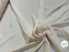 Tissu crêpe peau de pêche écru