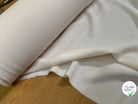 Tissu crêpe peau de pêche écru - détail du tissu