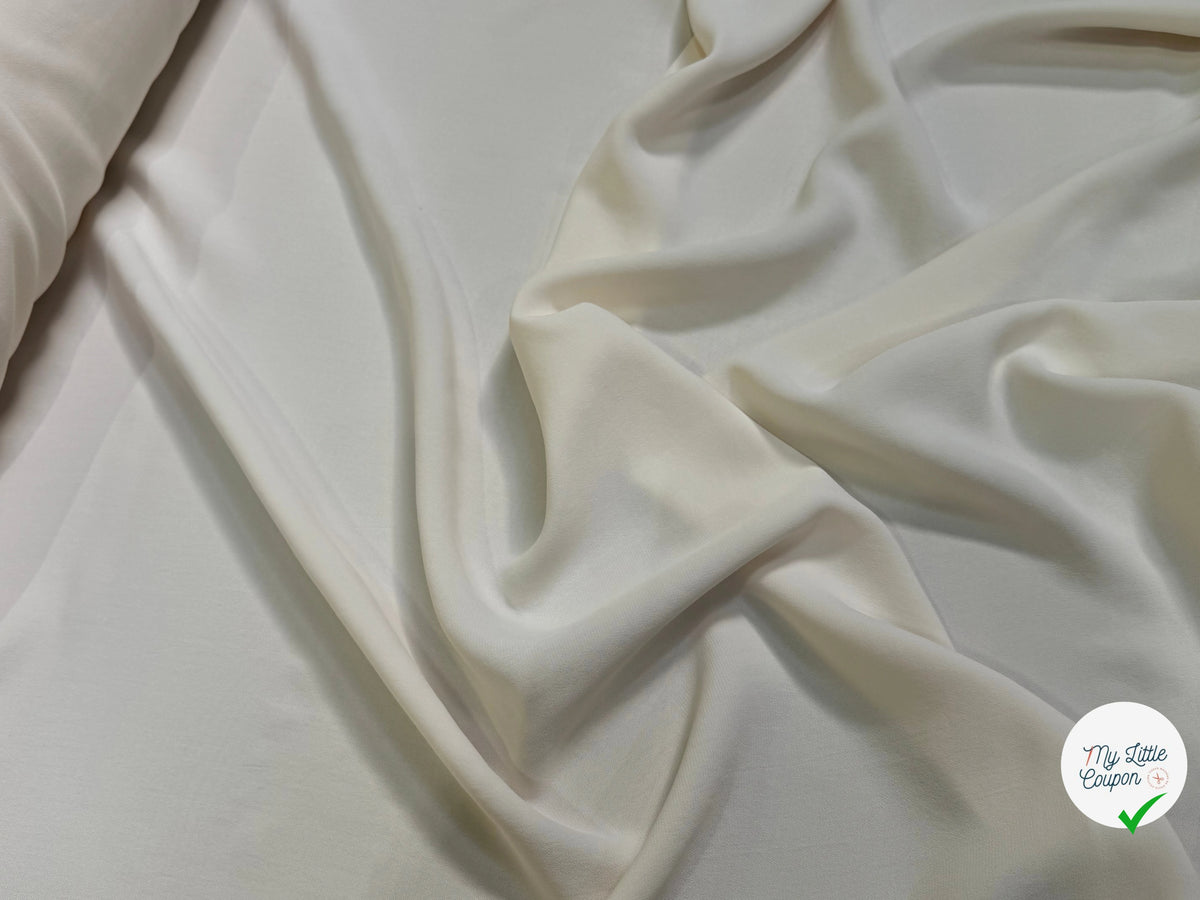 Tissu crêpe peau de pêche écru - tombé du tissu