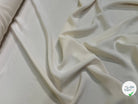 Tissu crêpe peau de pêche écru - tombé du tissu