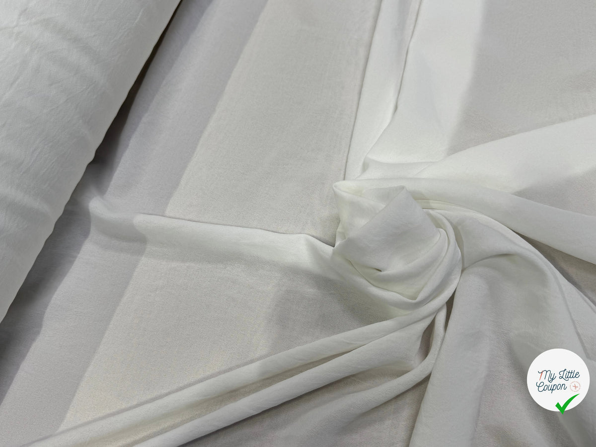 Tissu crêpe fluide texturé blanc cassé