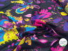CREPE GEORGETTE SOIE FIORI PSICHEDELICI SU SFONDO NERO MLC INTERN