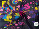 CREPE GEORGETTE SOIE FIORI PSICHEDELICI SU SFONDO NERO MLC INTERN