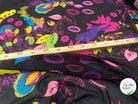 CREPE GEORGETTE SOIE FIORI PSICHEDELICI SU SFONDO NERO MLC INTERN