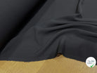 CRÊPE LOURD DE TAILLEUR AU TOMBÉ PLOMBANT NOIR 81% LAINE 16% SOIE - My Little Coupon