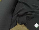 Tissu crêpe semi-lourd aspect gaze noir - détail du tissu