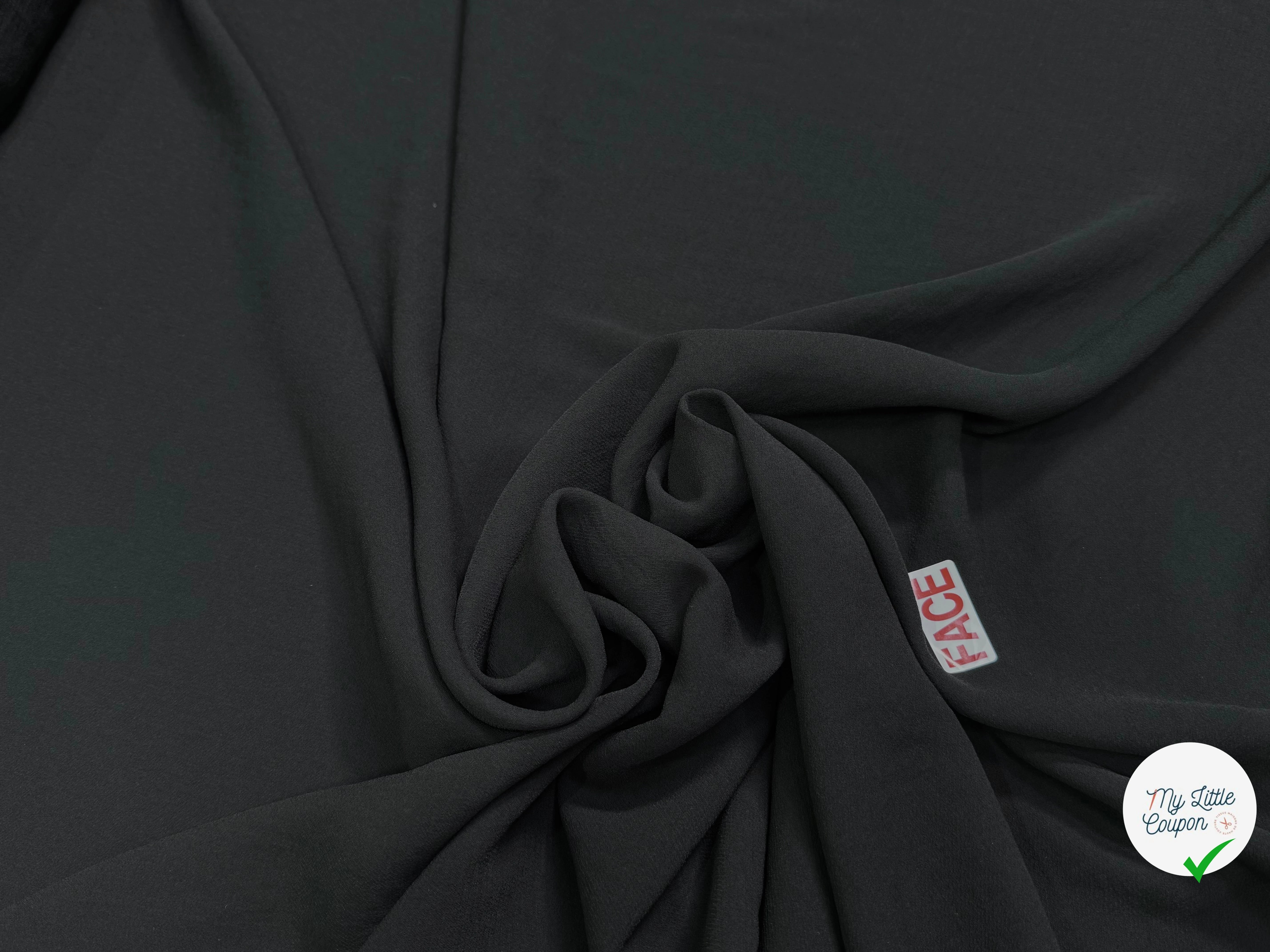Tissu crêpe semi-lourd aspect gaze noir - tombé du tissu