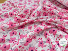 COTON GAUFFRÉ STRECH FLEURS ROSE FOND BLANC - My Little Coupon