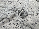 CRÊPE VISCOSE FOND BLANC MOTIFS COLOMBES ET TREFFLES NOIR - My Little Coupon