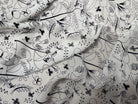 CRÊPE VISCOSE FOND BLANC MOTIFS COLOMBES ET TREFFLES NOIR - My Little Coupon