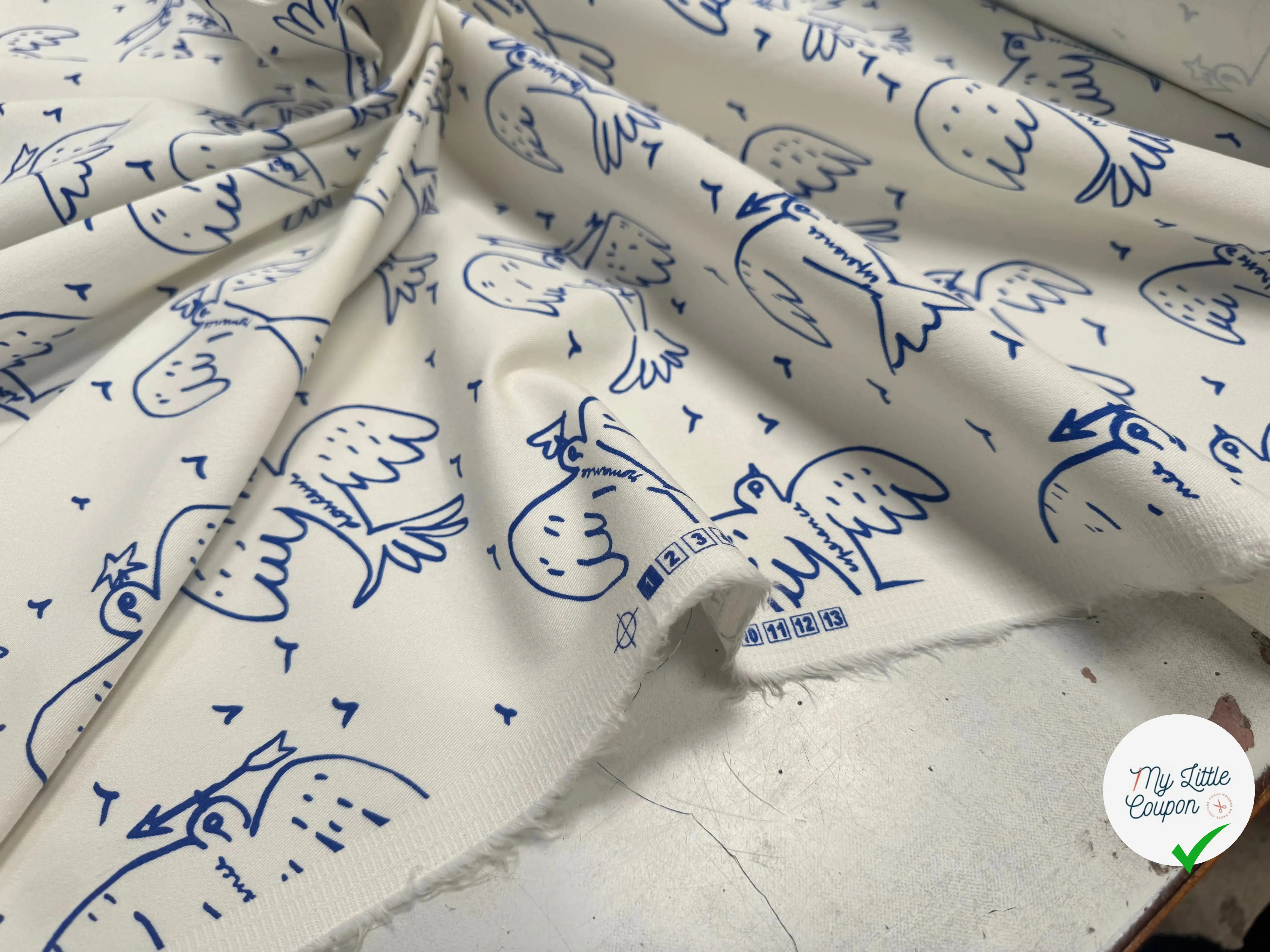 GABARDINE STRETCH DE COTON BLANC CASSÉ OISEAU BLEU - My Little Coupon