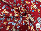 VISCOSE À FLEURS JAPONAISES BLEUES ET BEIGES SUR FOND ROUGE - My Little Coupon