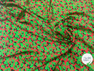 VISCOSE À FOND ROUGE AVEC MOTIFS FLORAUX VERTS - My Little Coupon