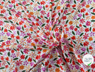 VISCOSE DOUCE TRES LEGEREMENT SATINEE PRINT FLEURS MULTICOLORES FOND BLANC - My Little Coupon