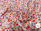 VISCOSE DOUCE TRES LEGEREMENT SATINEE PRINT FLEURS MULTICOLORES FOND BLANC - My Little Coupon