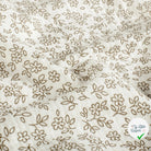 Double gaze de coton fleurs blanc cassé