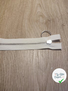 FERMETURE RIRI METAL NON SEPARABLE 30CM BLANC CASSÉ M6 - My Little Coupon