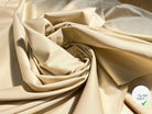 GABARDINE DE COTON STRETCH UNI BEIGE CLAIR ENVERS LISSE - My Little Coupon