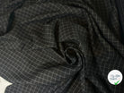 GABARDINE DE LAINE NOIRE QUADRILLÉE BLANCHE MLC INTERN
