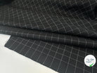 GABARDINE DE LAINE NOIRE QUADRILLÉE BLANCHE MLC INTERN