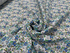 GAZE DE COTON FOND BLANC MOTIFS FLEURS PRINTEMPS BLEU ET VERT - My Little Coupon
