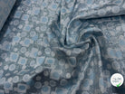 JACQUARD MÉTALLISÉ MOTIFS CIRCULAIRES ET GÉOMÉTRIQUES ARGENT FOND BLEU CIEL VERT D'EAU - My Little Coupon