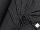 Tissu jacquard viscose laine géométrique noir - texture en gros plan