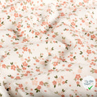 Jersey de coton fleurs blanc cassé