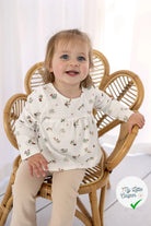 Jersey de coton fleurs blanc cassé