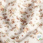 Jersey de coton fleurs blanc cassé