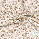 Jersey de coton fleurs blanc cassé