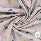 JERSEY DE COTON IMPRIMÉ DINOSAURES FOND SABLE - My Little Coupon