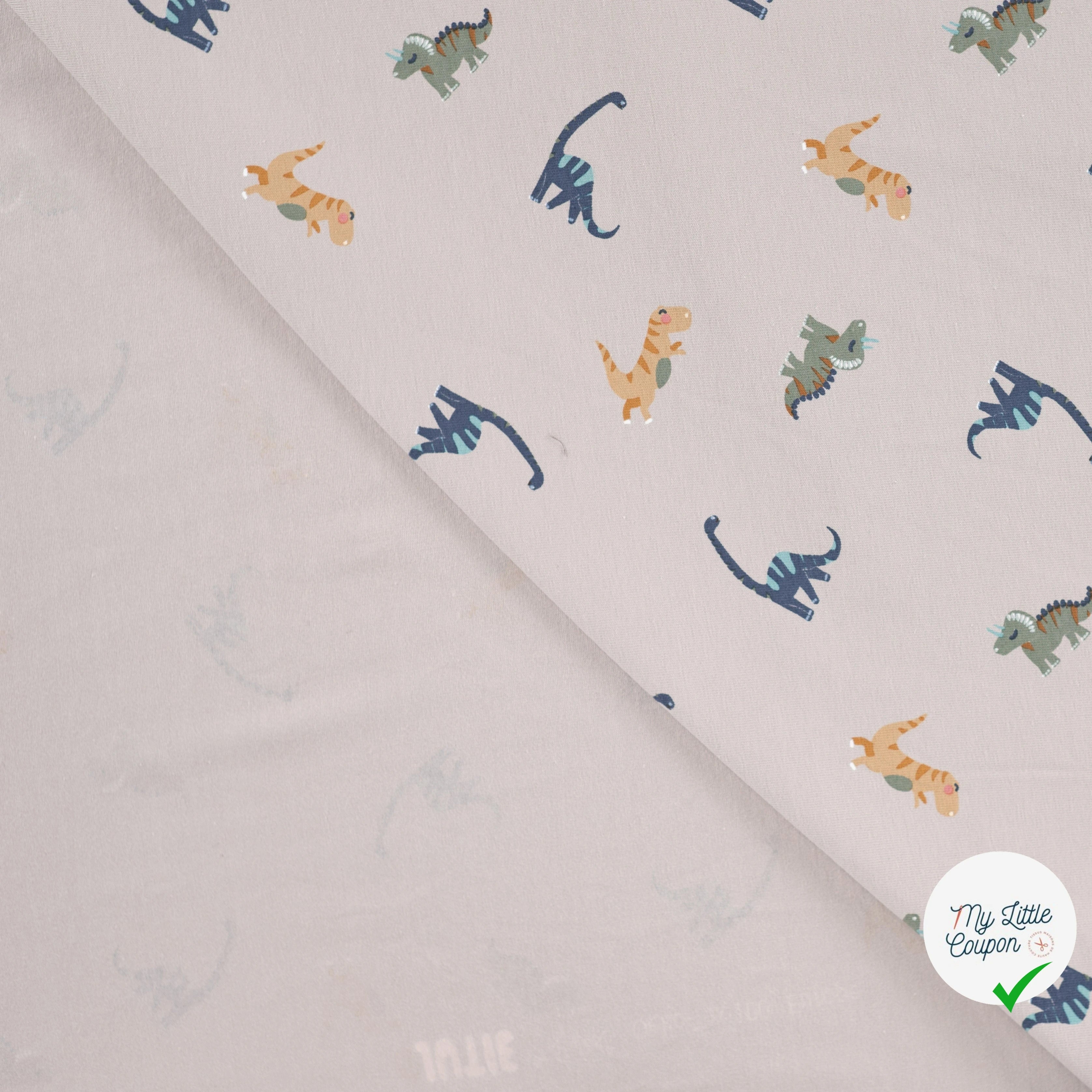 JERSEY DE COTON IMPRIMÉ DINOSAURES FOND SABLE - My Little Coupon