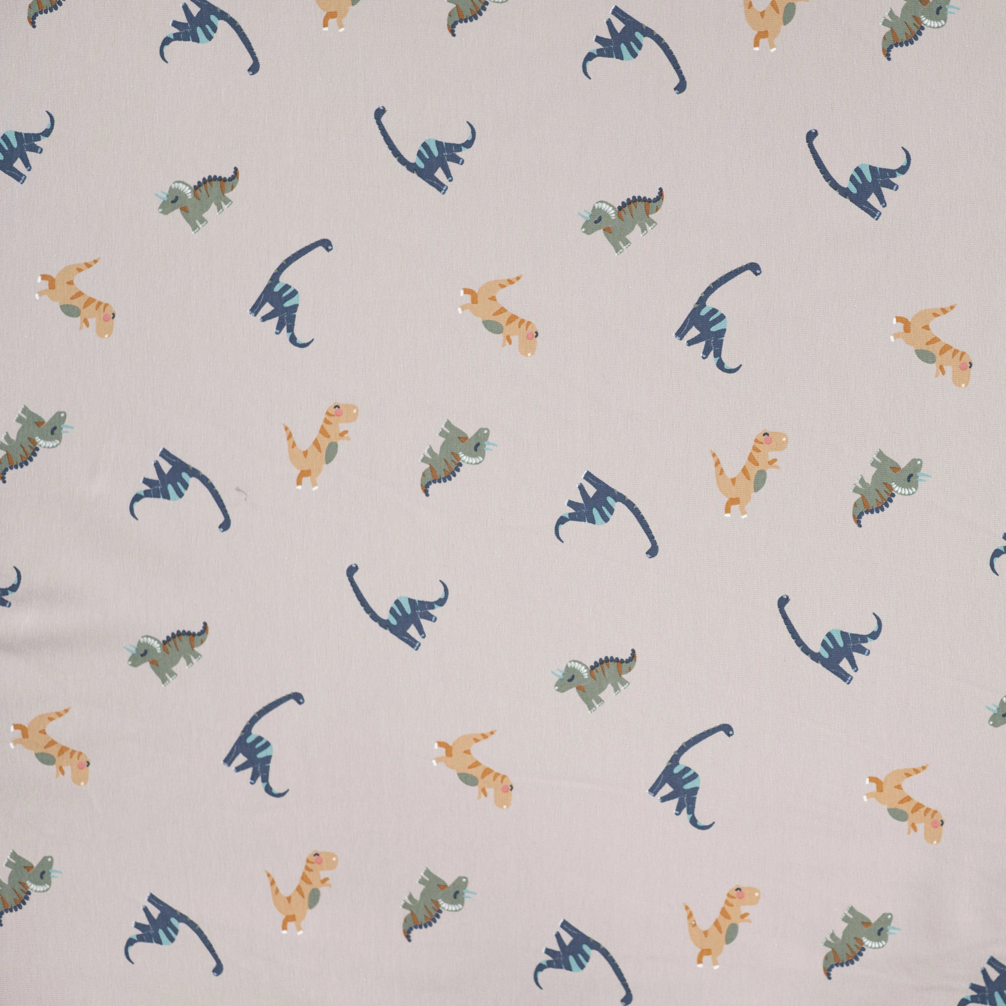 JERSEY DE COTON IMPRIMÉ DINOSAURES FOND SABLE - My Little Coupon