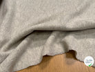 Tissu laine bouillie haute couture écru - texture en gros plan