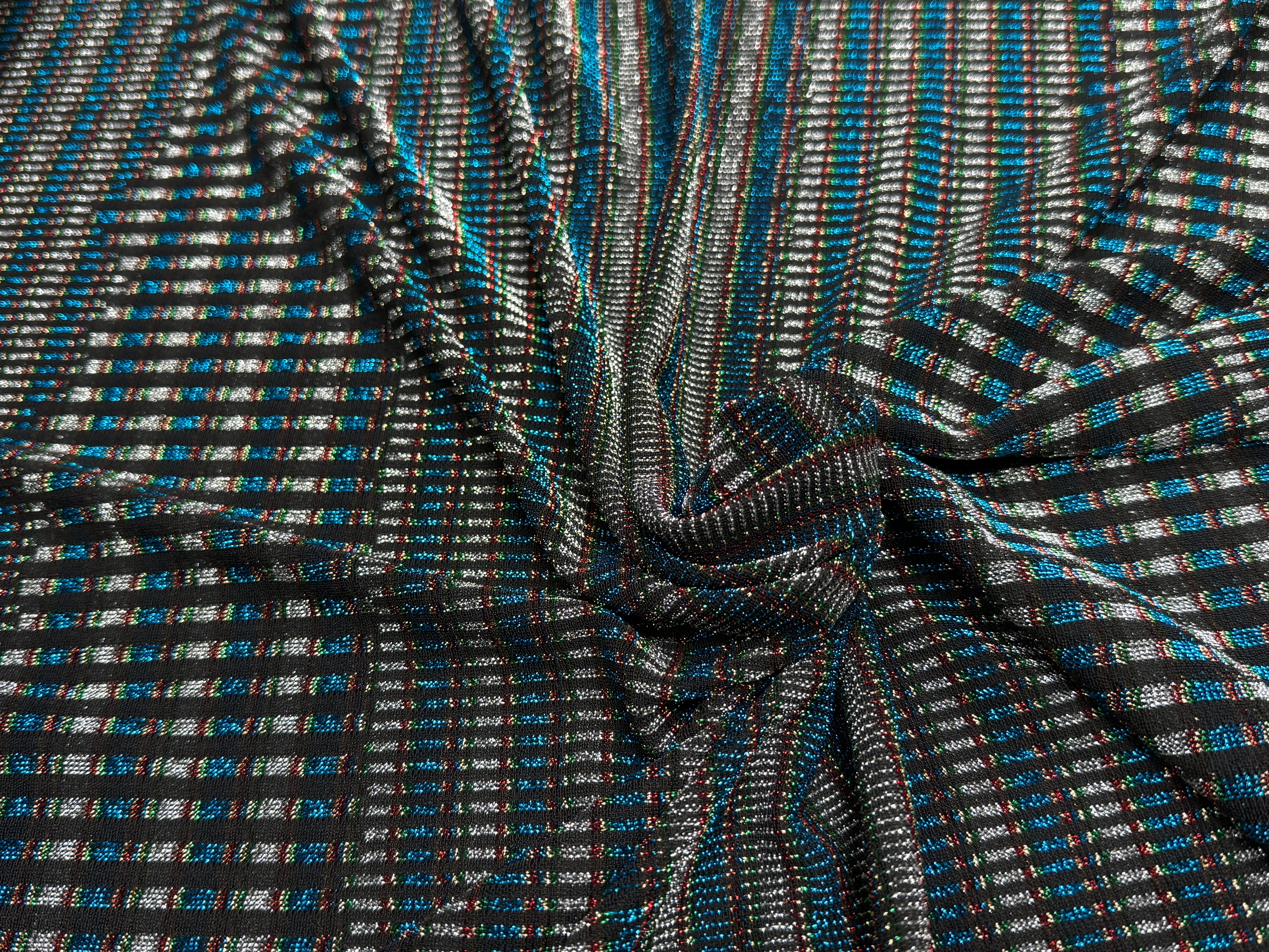 MAILLE FÊTE ULTRA STRETCH BRILLANT POLY INTERLOCK TURQUOISE/RED - My Little Coupon