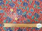 MOUSSELINE FLEURS ORIENTALES FOND ROUGE - My Little Coupon