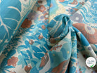 OTTOMAN LAINE VISCOSE FOND ÉCRU MOTIF FLEURS BLEU MARRON VERT 95CM - My Little Coupon