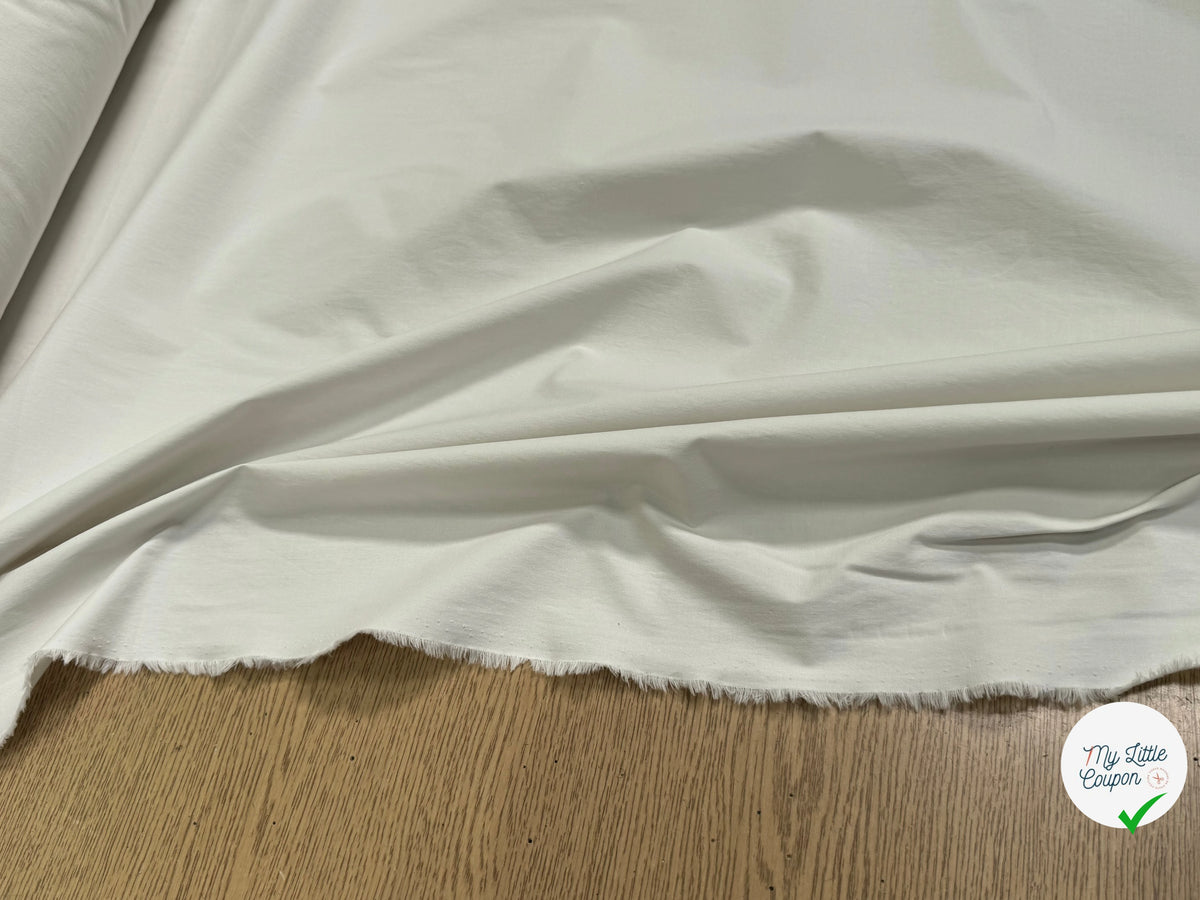 Tissu popeline de coton stretch craquante écru - tombé du tissu
