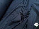 Tissu popeline de coton stretch bleu nuit - tombé du tissu